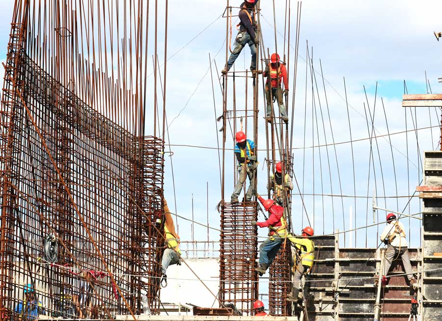 Construction workers on site. Courtesy: Unsplash