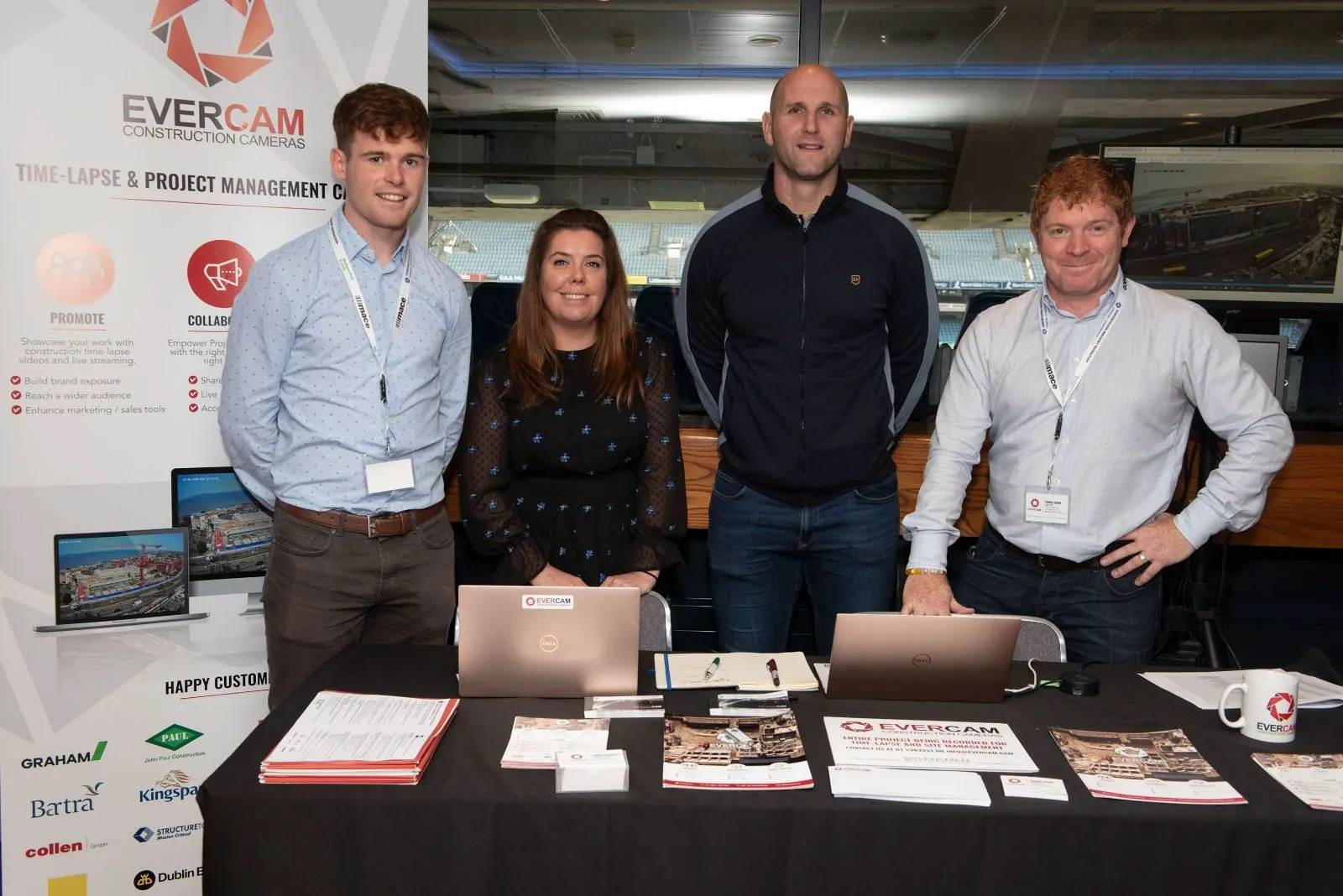 Fionn Hurley at Evercam booth at a construction event discussing safety incident on construction